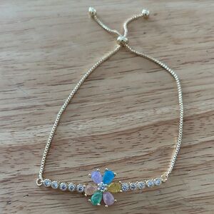 Pretty Bird Gold Bracelet with Multicolor Flower
